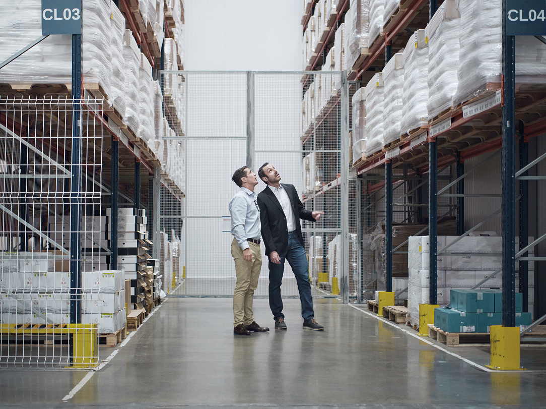 2 persons in a warehouse