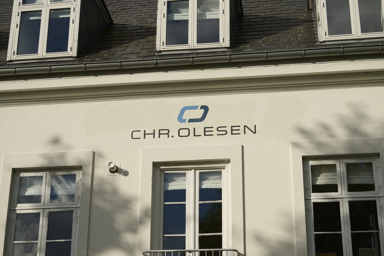 a building with the chr olesen logo
